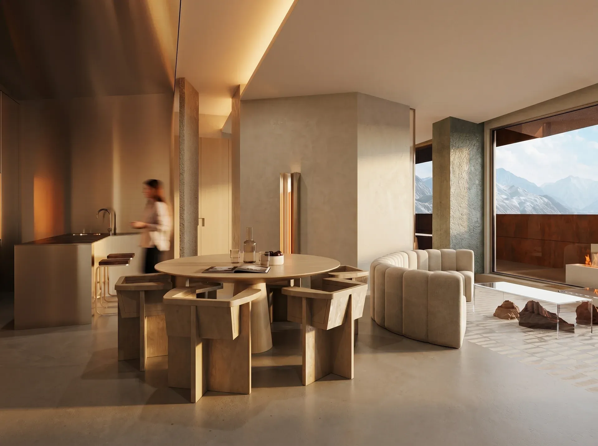 Living and dining area with a curved sofa and a mountain view